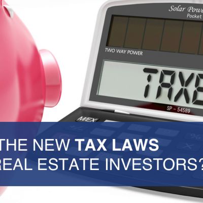 piggy bank ponders tax calculations